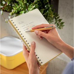 Wiro Leitz Cozy notebook. Hard covers. 80 sheets squared, DIN B5, yellow